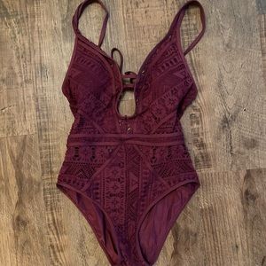 Becca maroon one piece